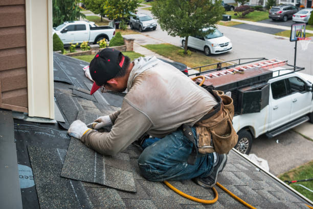 Professional Flat Roof Repair technician working in Amana, IA
